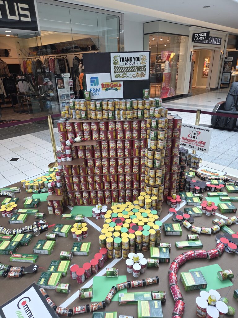 Snake made out of canned goods.